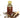 Bottle of clove oil with a scoop and cloves on a white background
