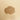 Loose Instant Lemon tea powder on a plain background.